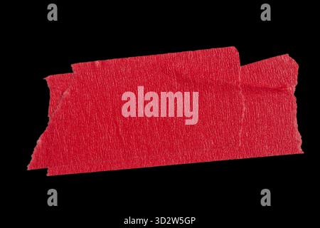 Ripped torn paper adhesive red masking tape on black isolated background Stock Photo