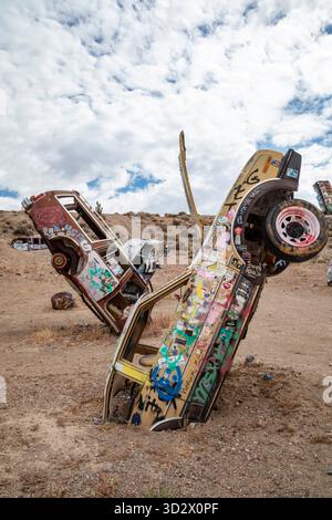 Mark Rippie International Car Forest of the Last Church. Part buried cars with ...