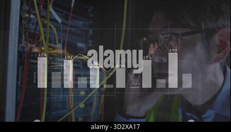 Monitoring IT technician holding smartphone beside racks in server room, cable overlay, copy space Stock Photo