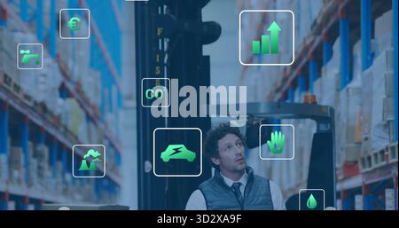 Warehouse operations manager monitoring floating AR icons in aisle near forklift and shelving racks Stock Photo
