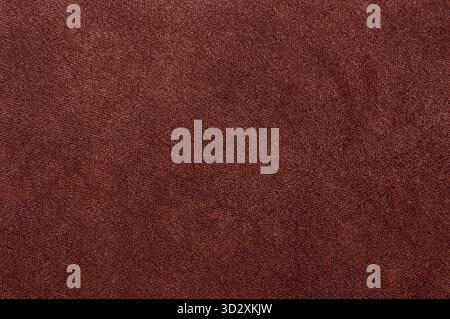Closeup of a rich red textile, showing a smooth and fine fabric texture Stock Photo
