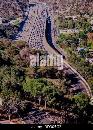 Aerial view of the lush green hills and dense tropical forest landscape ...