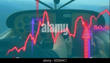Operating dual yokes while pilots monitoring analog gauges in cockpit, with red chart overlay Stock Photo