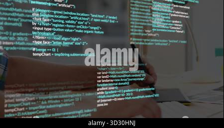 Leaning person wearing mustard sweater writing in notebook at home office desk, with code overlay Stock Photo