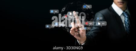 A businessman engages with a futuristic touchscreen interface displaying various social media metrics and SEO analytics, emphasizing digital growth an Stock Photo