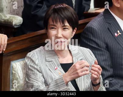 Japanese Prime Minister Sanae Takaichi (center) attends a cabinet ...