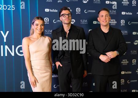 London, UK. 03rd Nov, 2025. London, red carpet arrivals at the Music Trusts Awards. Pictured: (L-R) Sian Welby, Jordan North, Chris Stark Credit: Independent Photo Agency/Alamy Live News Stock Photo