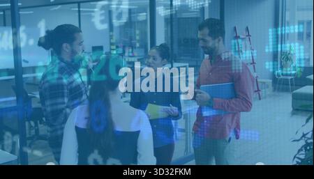 Project team analyzing financial data overlays on glass partition in office, with colored folders Stock Photo