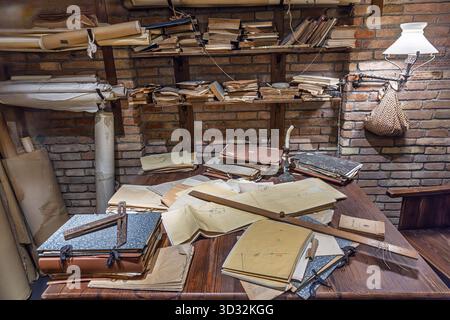 Mock-up of Antoni Gaudí’s office with drawings, tools, and plans in the Sagrada Família museum, Barcelona, Spain Stock Photo
