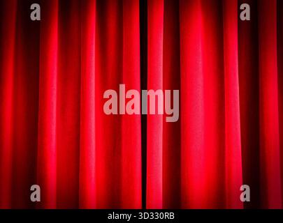 Close-up of red closed curtains as background Stock Photo