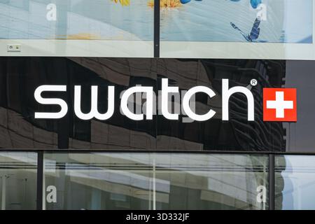 Swatch watches brand logo on the exterior of a store Stock Photo