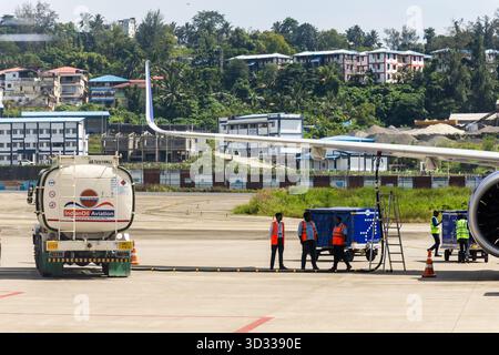 airport operations indigo flight refueling and loading through aerobridge image is taken at Veer Savarkar International Airport Port Blair in Andaman Stock Photo