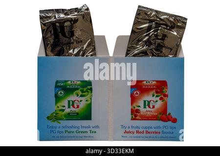 Two big-tasting samples from PG tips isolated on white background - PG Tips pure green tea & PG Tips Juicy Red Berries teabags  tea bags Stock Photo