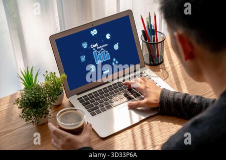 Cost reduction, cost saving concept shown on computer screen brisk, corporate business efficiently save cost and company resources by reduction of Stock Photo