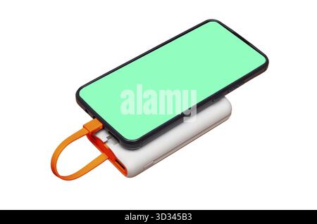 A smartphone with a green screen is charging on a portable power bank, showcasing modern technology Stock Photo