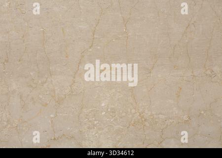 Elegant beige marble texture featuring fine veins, great for architectural projects Stock Photo