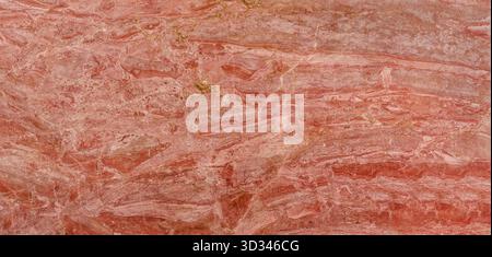 High-resolution red marble texture with a smooth surface and visible veins. Natural red marble texture with unique golden veins, ideal for luxury inte Stock Photo