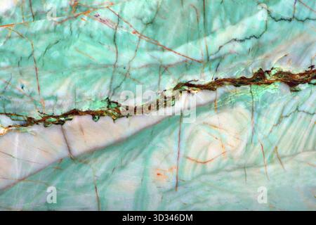 Large format texture, turquoise quartzite with brown veins and beige flecks Stock Photo