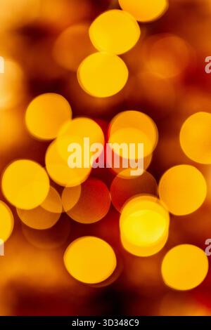 Golden defocused Christmas lights background. Stock Photo
