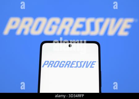 In this photo illustration, Progressive Corporation logo seen displayed ...