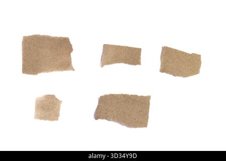 Group of Old parchment paper torn edges strips isolated. Piece of brown torn edges paper ripped isolated on white background Stock Photo