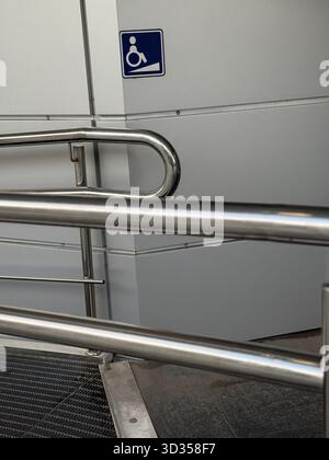 Accessible Ramp Sign In A Ramp Examples Accessible ramp entry sign Stock Photo - Alamy
