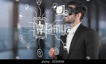 A businessman in a sleek suit uses a virtual reality headset to explore digital shopping options in a modern office, showcasing the intersection of Stock Photo