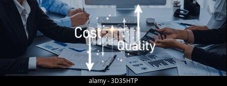 A business meeting focused on analyzing cost and quality metrics. Participants discuss reports while calculating data, emphasizing effective Stock Photo
