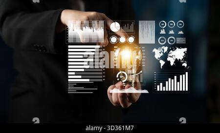 A business professional interacts with innovative digital data visualizations and graphs in a high-tech setting, showcasing modern analytics and Stock Photo