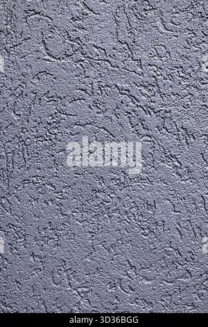 Textured gray concrete wall surface with rough, irregular patterns suitable as a background Stock Photo