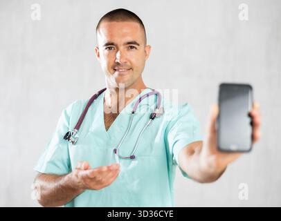 Doctor employs modern communication Stock Photo