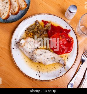 Roasted rabbit served with potato and vegetables Stock Photo