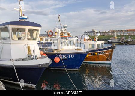 Boats moored in Seahouses Harbour, Northumberland, England, UK Stock Photo
