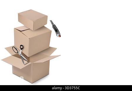 Cardboard boxes, scissors and paper knife in air on white background Stock Photo