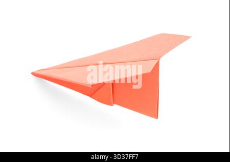 Orange paper plane on white background Stock Photo