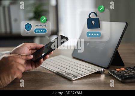 Two-factor authentication (2FA) approve login on smartphone Cybersecurity (2FA). User approves a sign-in request on smartphone to unlock a device Stock Photo