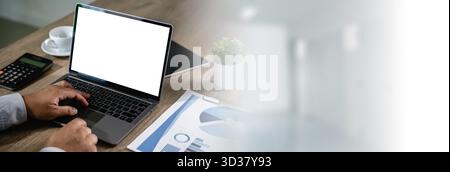 computer mock up blank screen using laptop with blank white copy space office interior Stock Photo