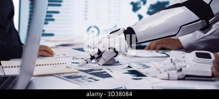 A futuristic work scene featuring a robotic arm collaborating with human colleagues in a data analysis meeting, showcasing advanced technology in a Stock Photo