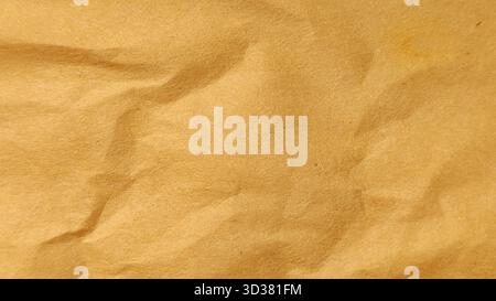 Crumpled Old Brown Kraft Paper Macro Texture Full Frame Background with Vintage Character Stock Photo