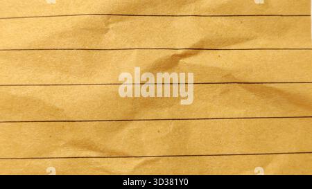Wrinkled Lined Old Brown Note Paper Macro Texture Vintage Background with Copy Space Stock Photo