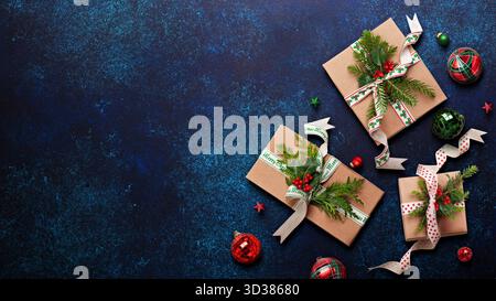 Christmas Gifts and Ornaments on Blue Festive Surface Stock Photo