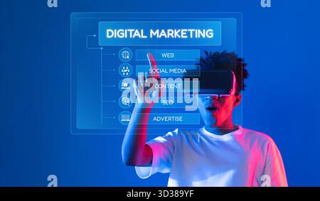 A young individual interacts with digital marketing concepts using virtual reality technology. The image highlights the integration of innovative Stock Photo