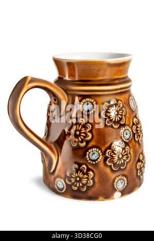 Vintage brown glazed ceramic jug isolated on white background Stock Photo