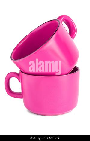 Two fuchsia pink ceramic empty coffee cups isolated on white background Stock Photo