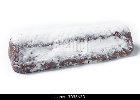Traditional Christmas Stollen with Raisins and Powdered Sugar isolated on white background Stock Photo