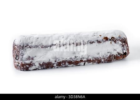 Traditional Christmas Stollen with Raisins and Powdered Sugar isolated on white background Stock Photo