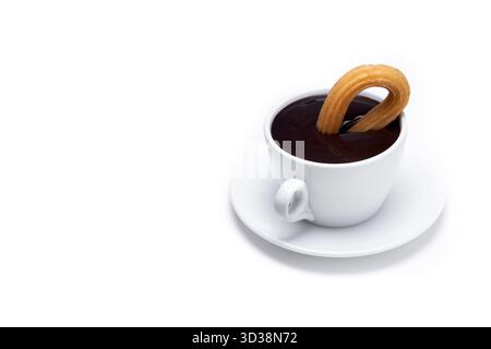 Spanish churros with hot thick chocolate in a white cup isolated on white background Stock Photo