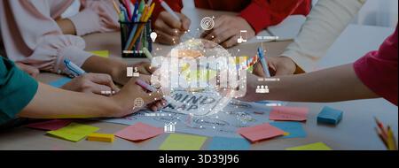 A diverse team collaborates on a mind map using colorful sticky notes and digital graphics. The scene represents innovation, communication, and Stock Photo
