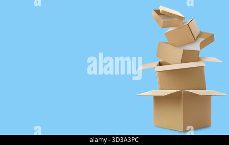 Cardboard boxes in air on light blue background. Banner design with space for text Stock Photo