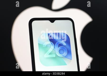In this photo illustration, the Apple iOS 26 logo is seen displayed on a smartphone screen Stock Photo